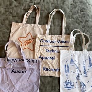 Assortment of tote bags including a cute Austin outdoor voices one!